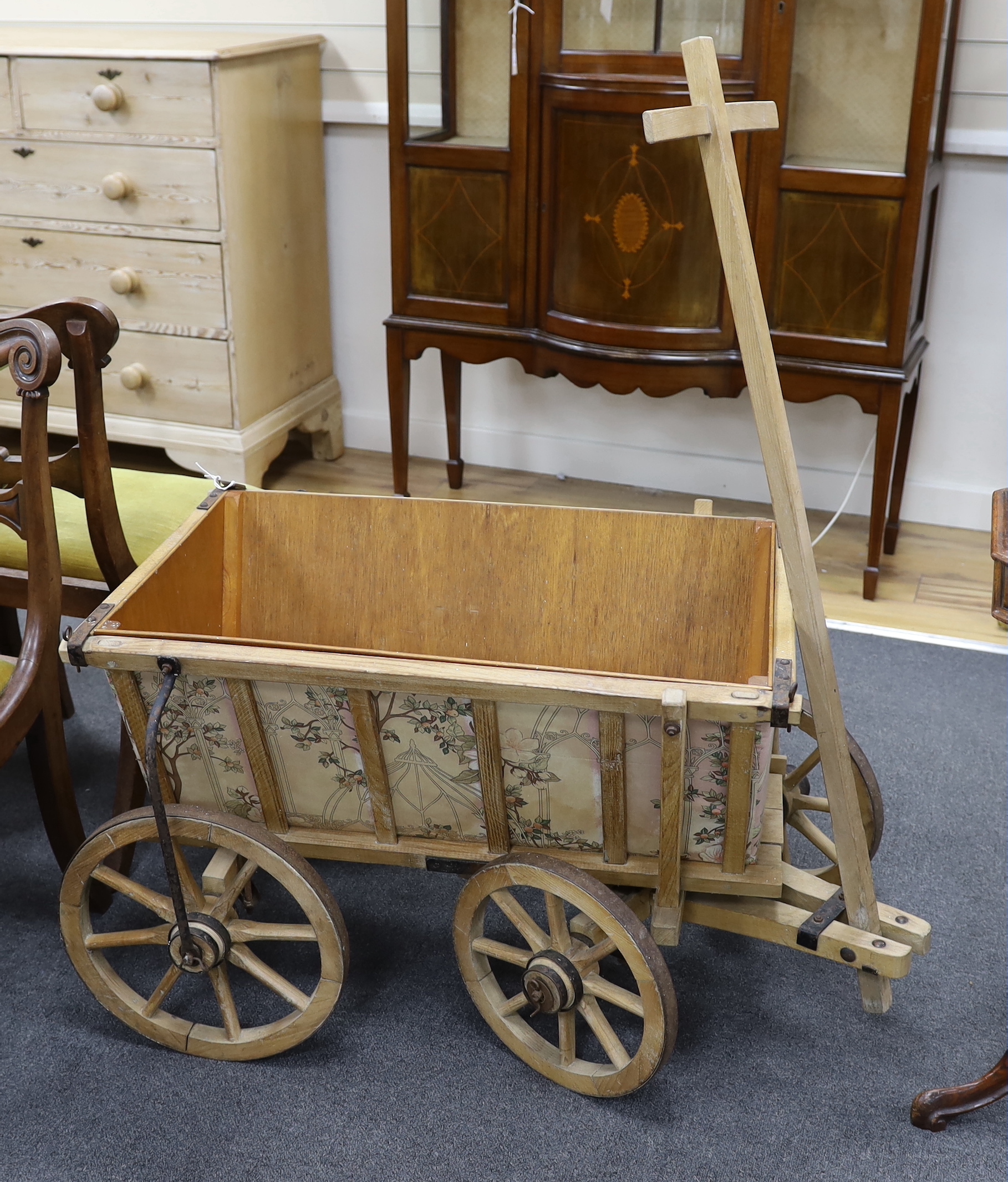 A vintage oak dog cart with later liner, length 78cm, depth 55cm, height 55cm